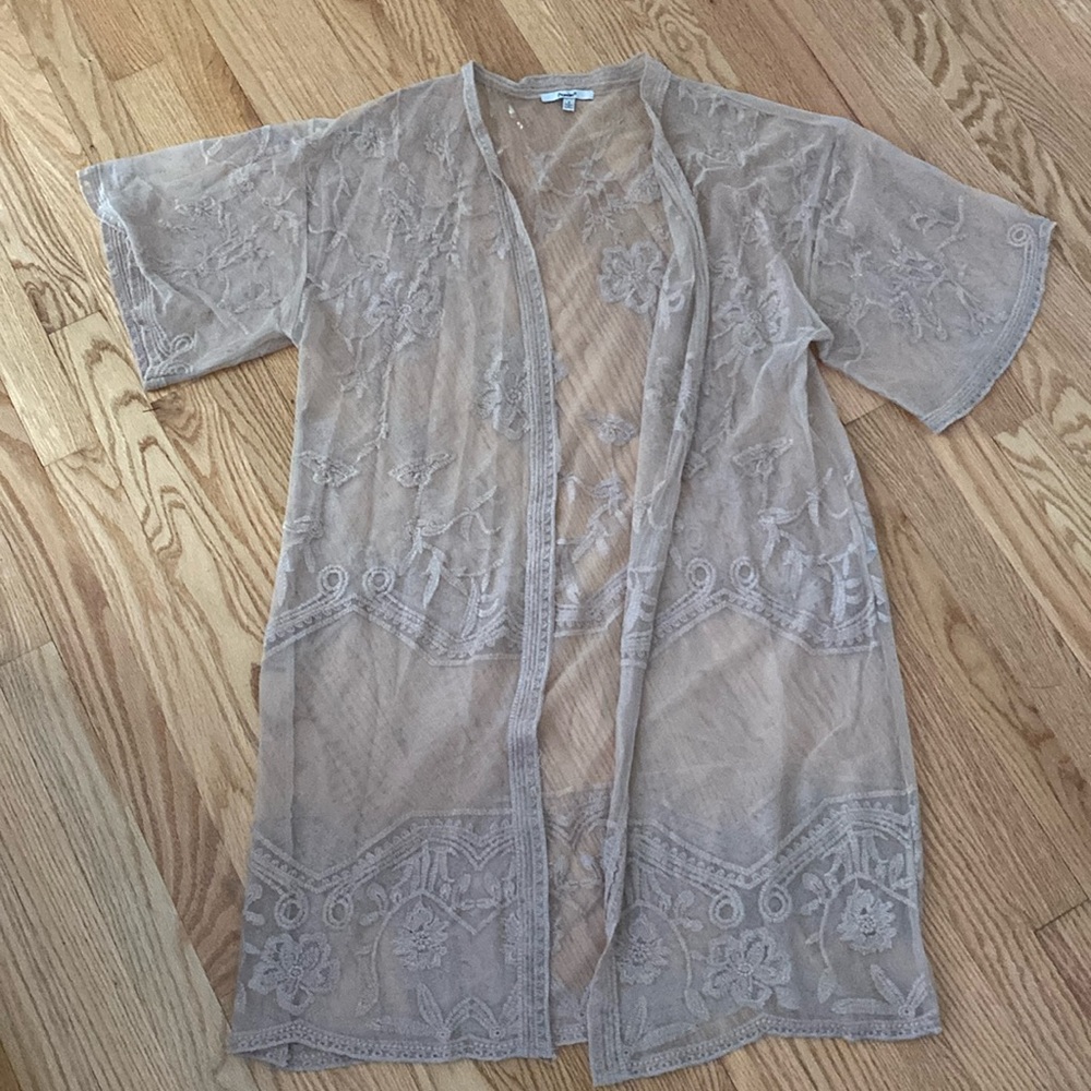 Transparent cardigan.